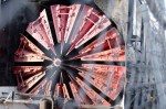This is a train car with a snow blower!