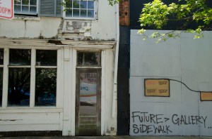 Unrestored storefront on Dexter St.