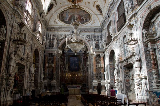 An island of tranquility in the bustling market - the Sicilian Baroque church of the Immaculata.