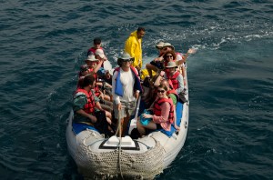 A panga full of passengers. Guide Hernan is in the bow.