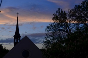 Evening sky from our hotel - looking past the little church that was one of the buildings in this little cluster of castle, mansion and more.
