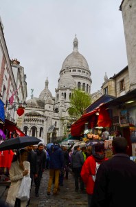 Montmartre street with Sacre Couer in the background.